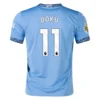 Jeremy-Doku-Manchester-City-2024-25-Home-Jersey.webp
